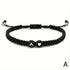 Black braided bracelet with letter &
