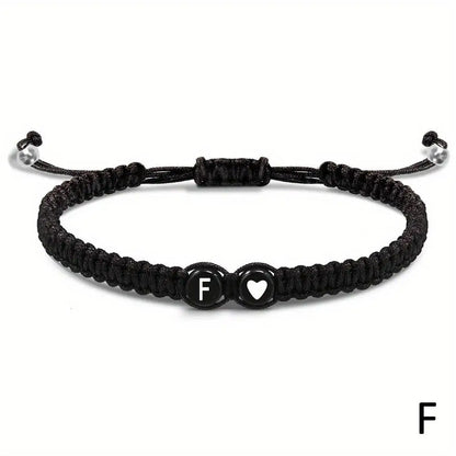 Black braided bracelet with a heart and letter &