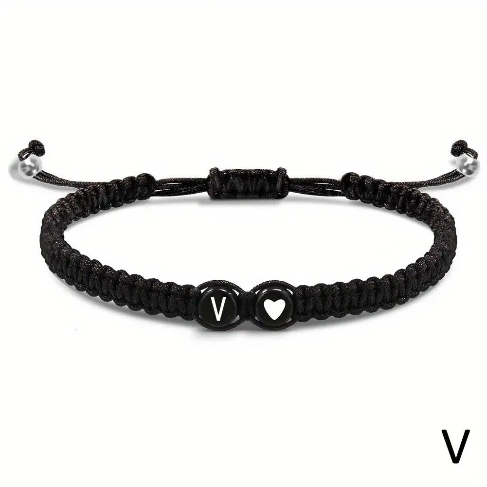 Black braided bracelet with letter &