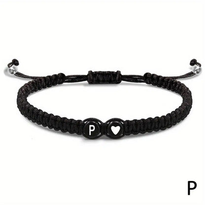 Black braided bracelet with letter &