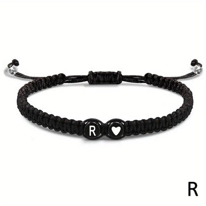 Black braided bracelet with letter &