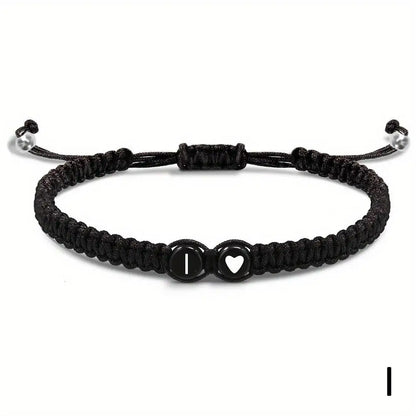 Black braided bracelet with a heart and letter &