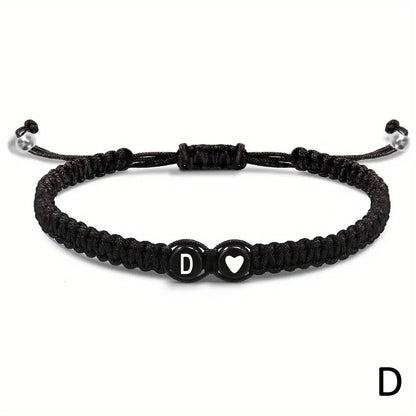 Black braided bracelet with letter &
