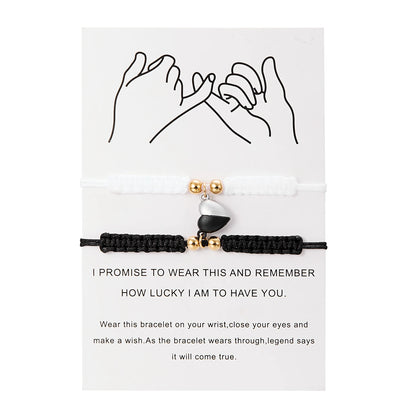 Bracelet with black cord and gold beads on a card with text and hand illustrations