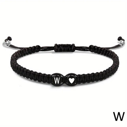 Black braided bracelet with letter &