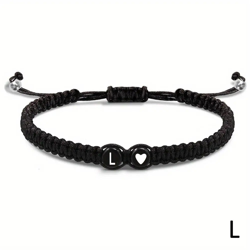 Black braided bracelet with a heart and letter &