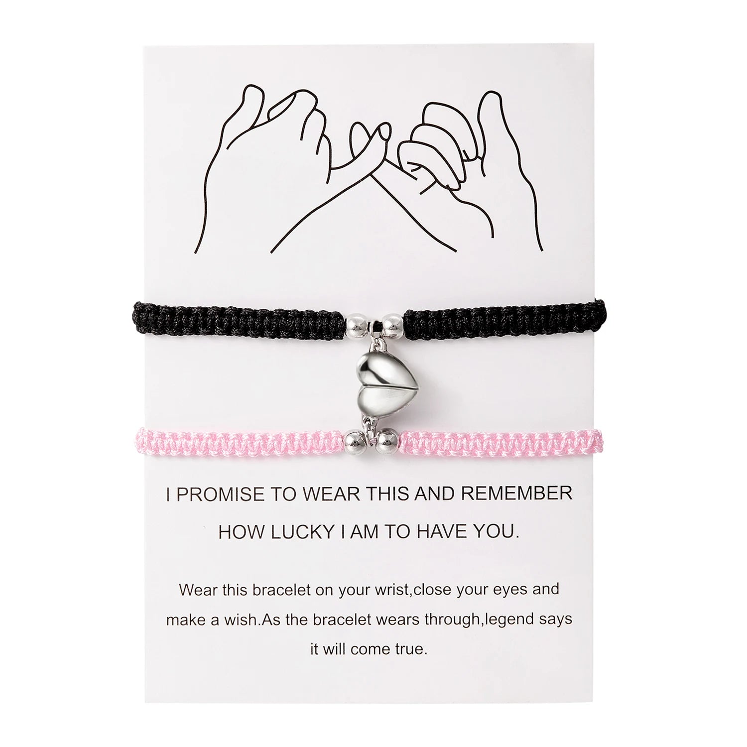 Black and pink bracelet with a heart charm on a white card with text.