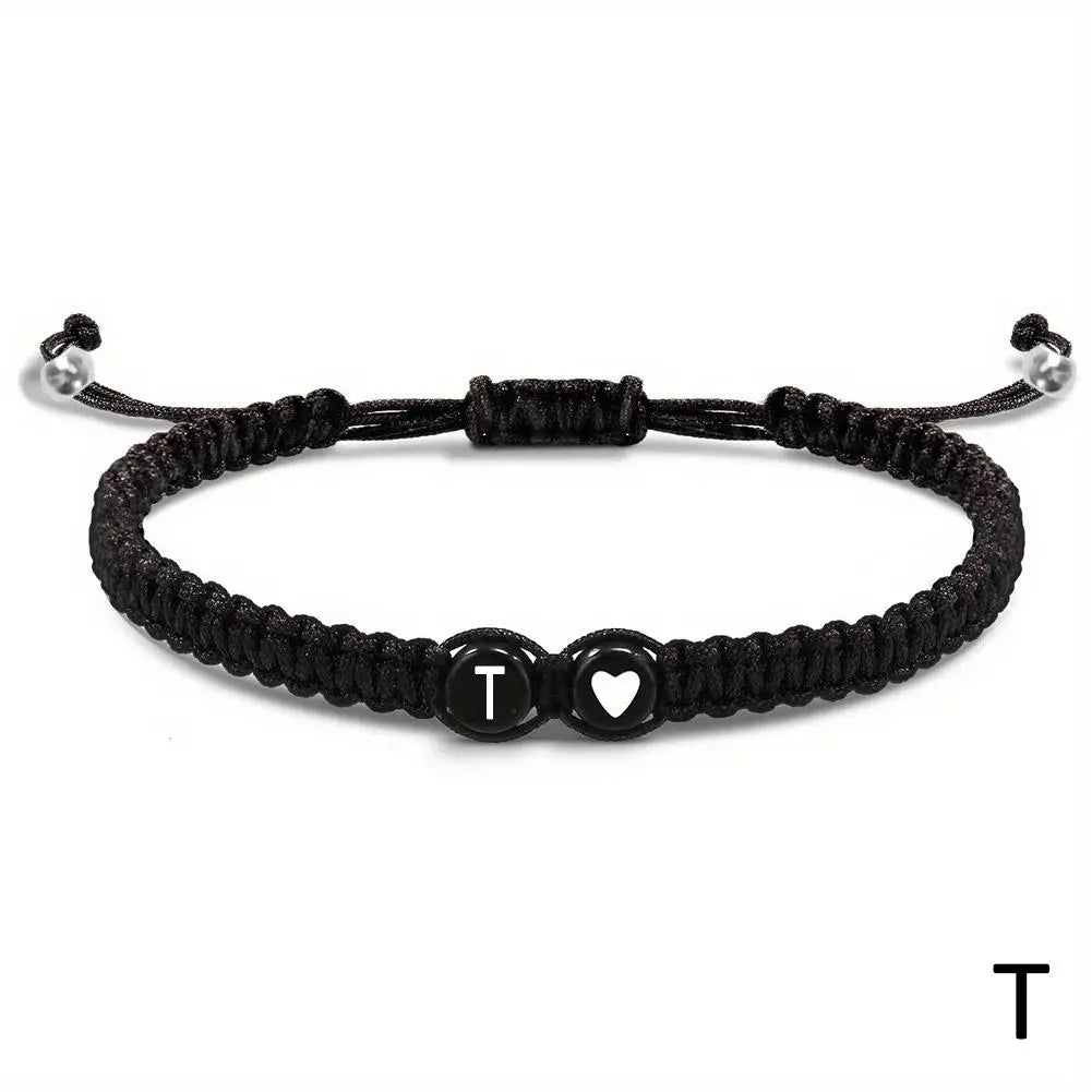 Black braided bracelet with letter &