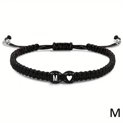 Black braided bracelet with letter &